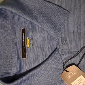 NWT Men's Golf Shirt Greg Norman Shark logo priced separately. BLUE